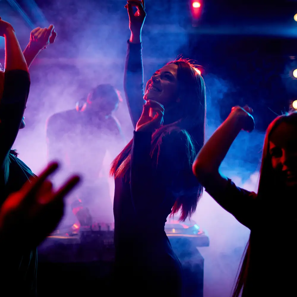 people dancing to dj at private party